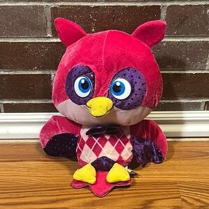 Pink and Purple Stuffed Animal Toy with Whimsical Design